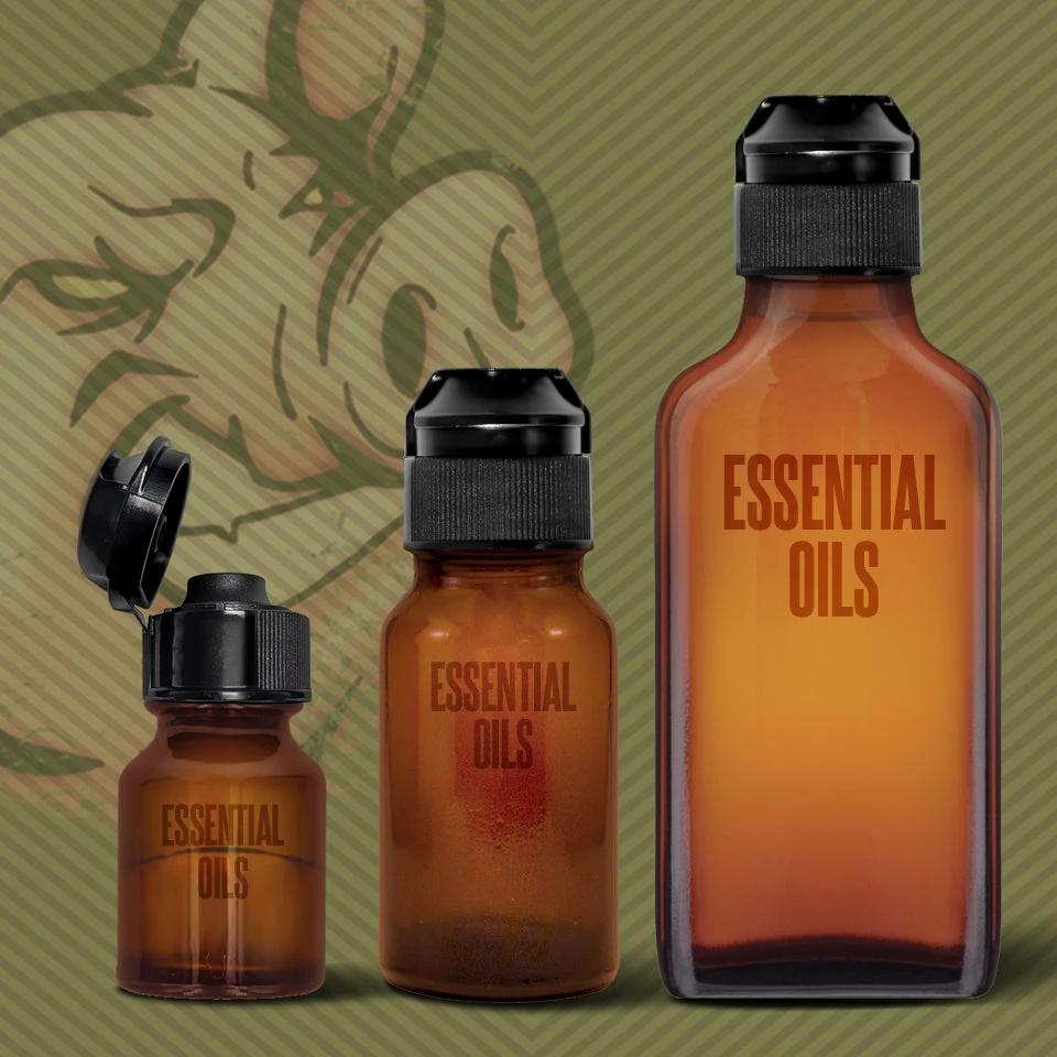 Pig Snout Flip top caps on 3 amber essential oil bottles of different sizes, Fort Troff gay gear at Boyzshop
