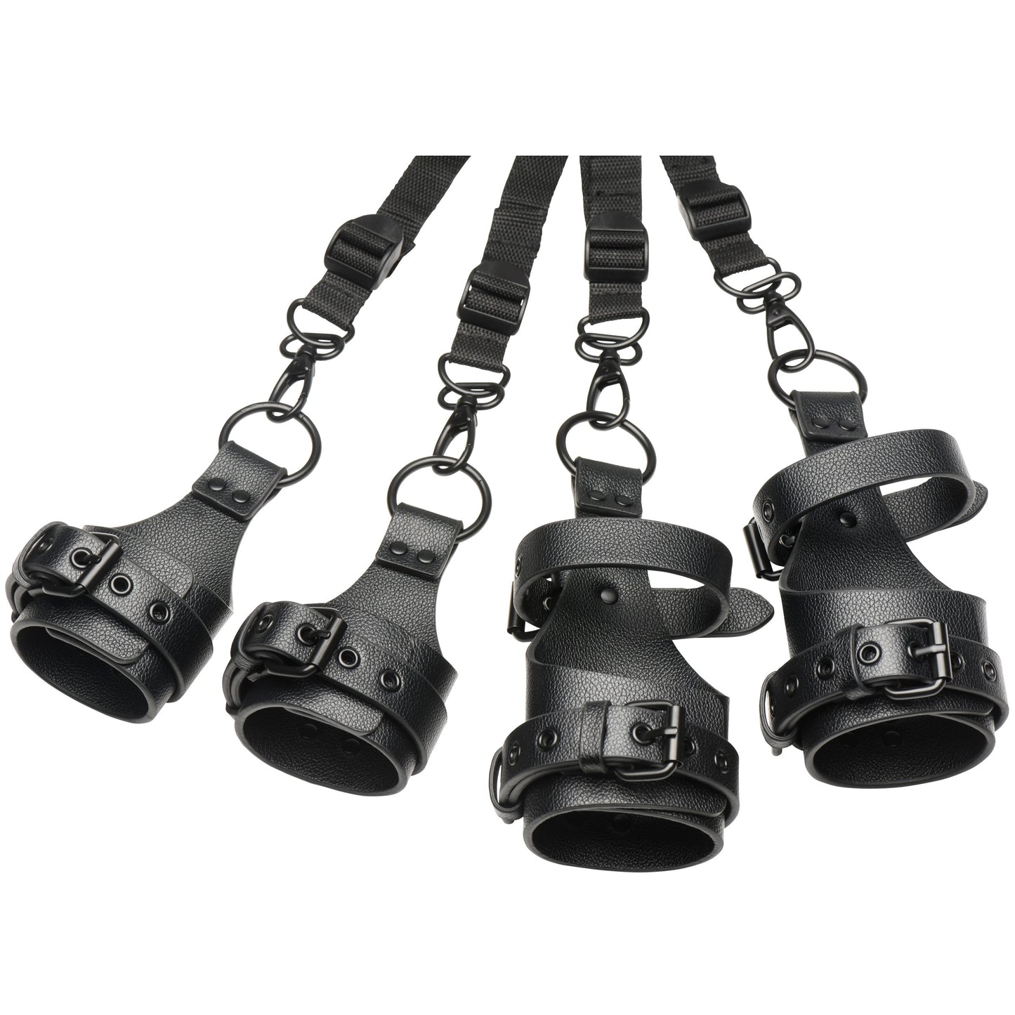 Set of black leather restraints with straps on a white background