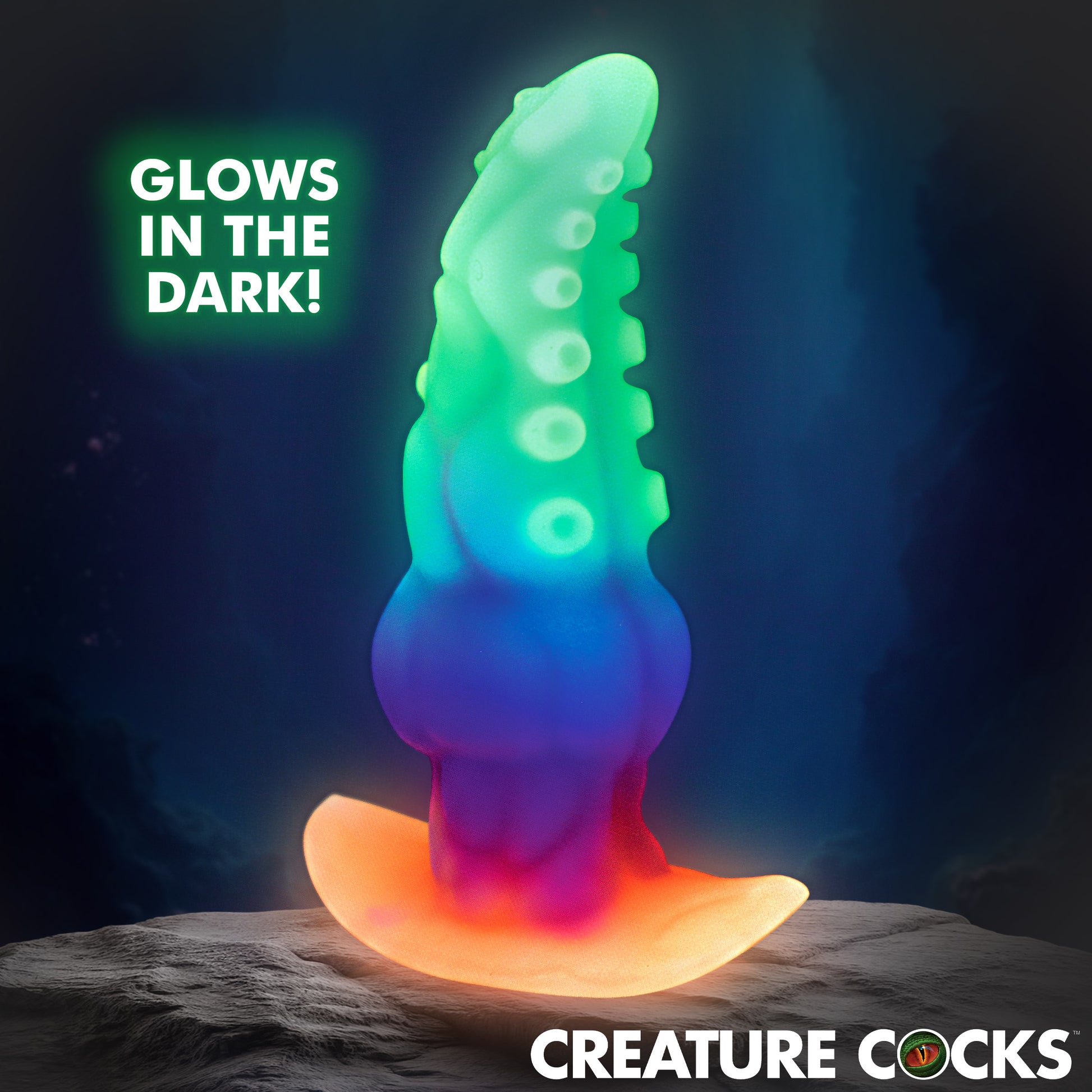 GLOWTOPUS anal plug for men glowing green in the dark showing activated
glow-in-the-dark silicone