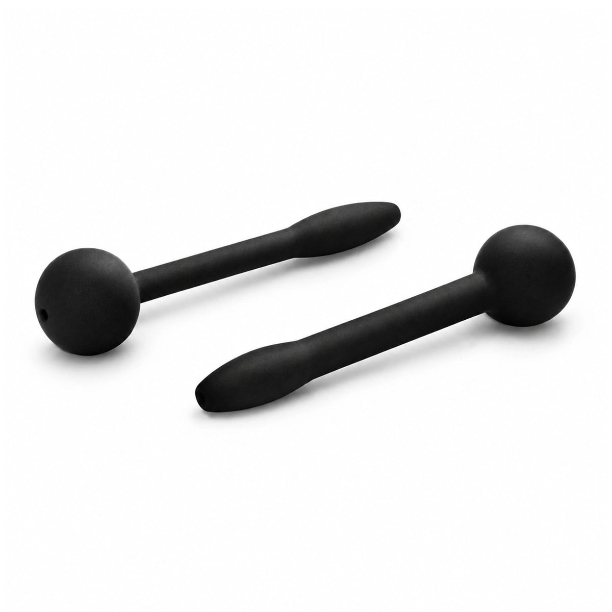2 black silicone penis plugs with ball grip ends laid out on white, Fort Troff gay gear at Boyzshop