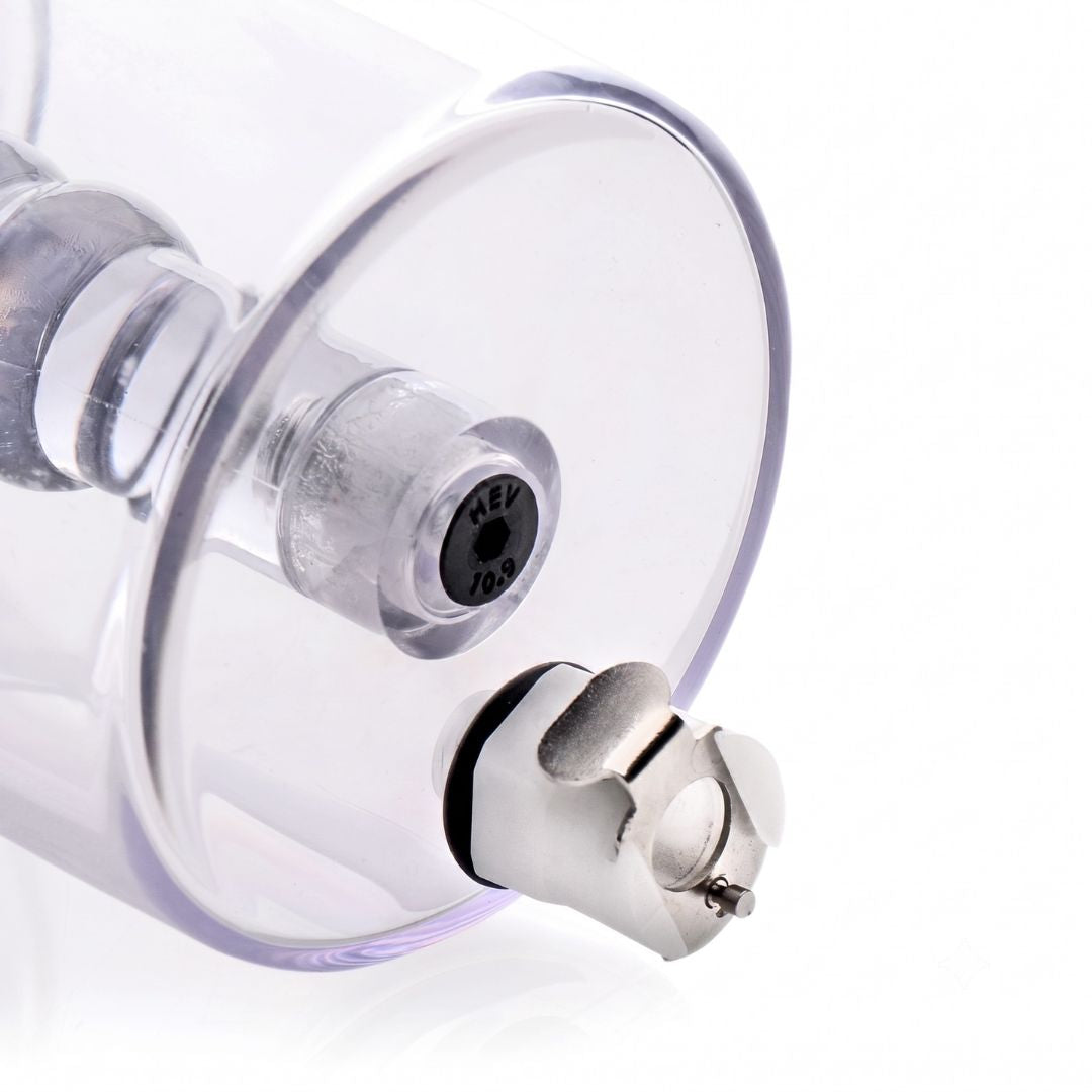 Close-up of the anal pump cylinder showing the integrated air-release valve and vacuum connection port for controlled pressure adjustment.
