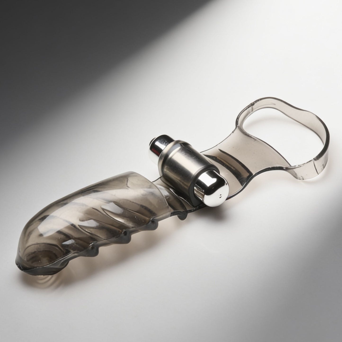Full view of a smoke-colored vibrating finger glove with integrated finger sleeve, textured shaft, and detachable bullet vibrator for targeted internal stimulation.