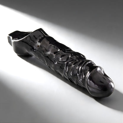 sleek black cock sheath with pronounced texture designed for enhanced pleasure and fit