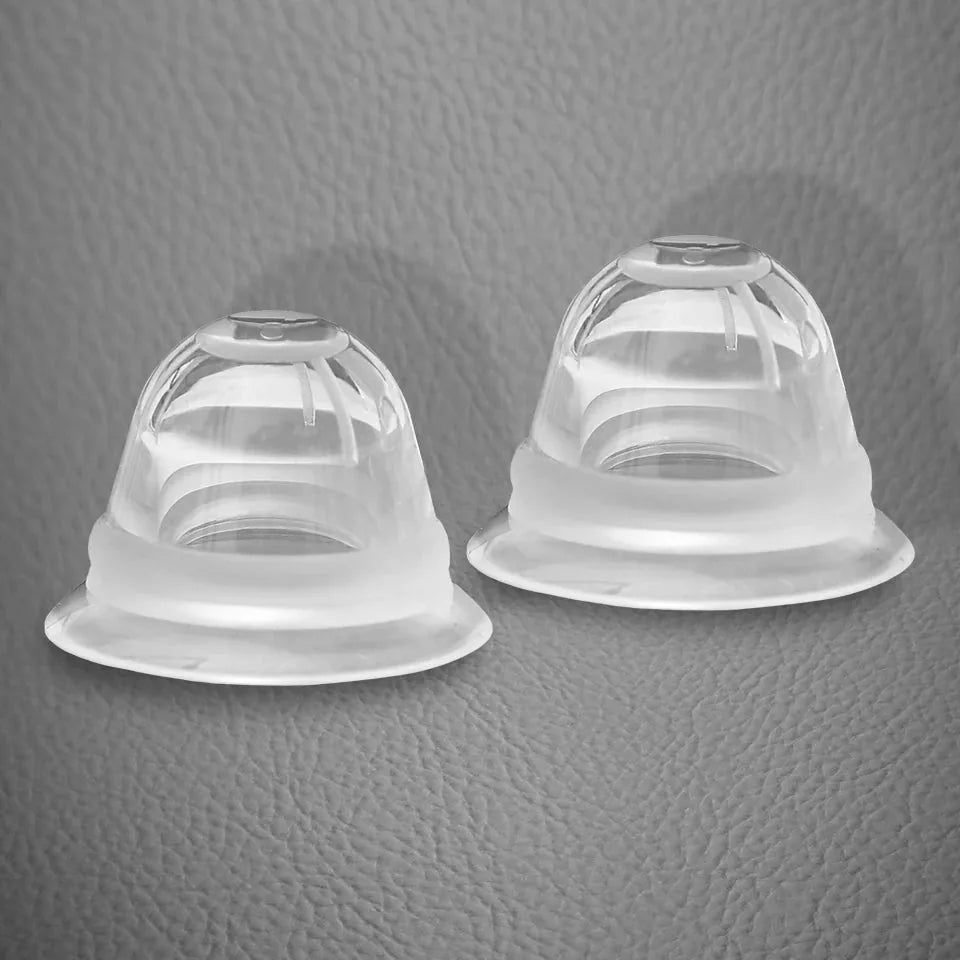 Large silicone nipple sucker pair shown together. Fort Troff.