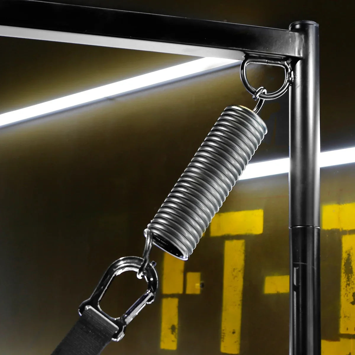 Sling Springs hooked to a Fort Troff sling stand frame with the strap clipped below