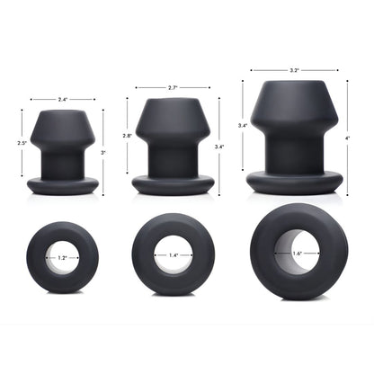 size comparison chart of three hollow silicone anal dilators with measurements and inner diameters shown