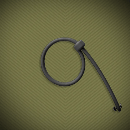 Clamp-It silicone cock ring looped with its pull strap on an olive background, Fort Troff gay gear at Boyzshop