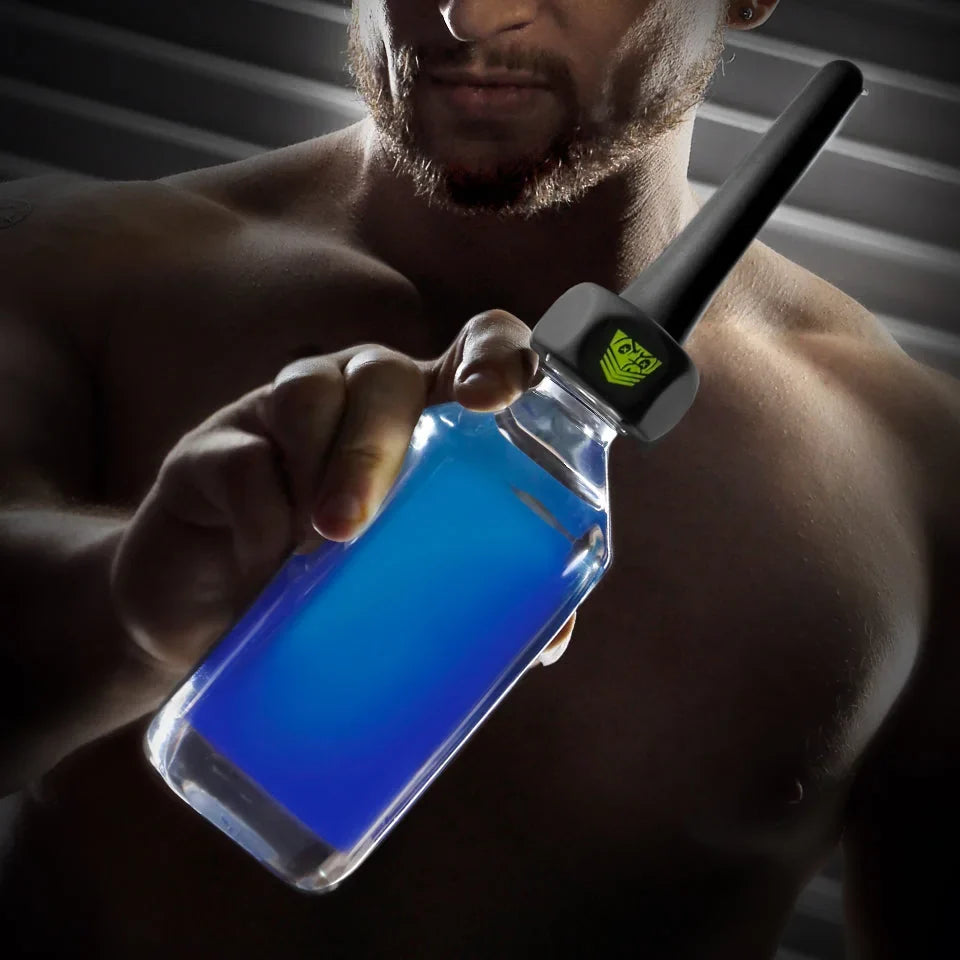 Model holding a water bottle fitted with the WTR-works douche nozzle, Fort Troff gay gear at Boyzshop