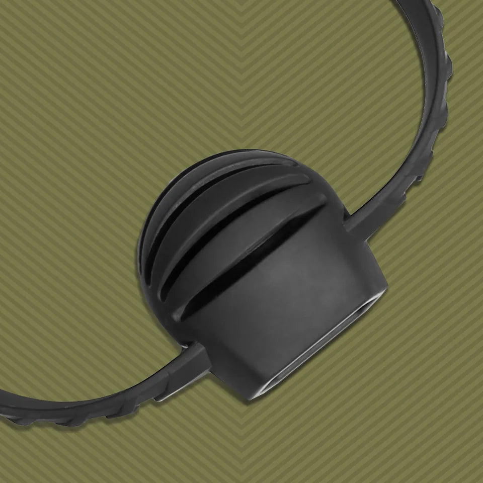 Close-up of the ridged silicone ball gag bite fins on an olive background, Fort Troff gay gear at Boyzshop
