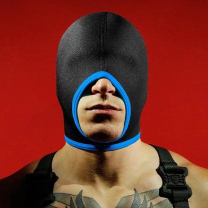 Blind Skullfuck bondage hood in black neoprene with blue mouth trim on a harnessed model, Fort Troff gay gear at Boyzshop