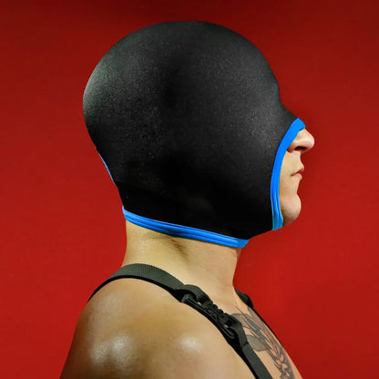 Side profile of the Blind Skullfuck neoprene hood in blue trim, eyes fully covered, Fort Troff gay gear at Boyzshop
