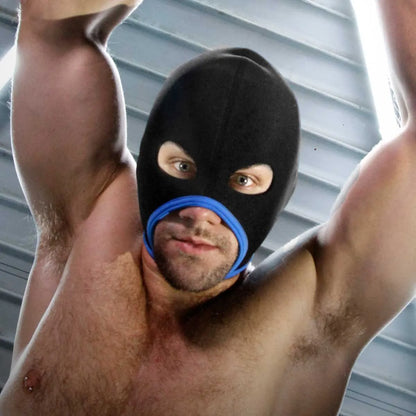 Shirtless man in the blue trim Skullfuck neoprene hood with his arms raised, Fort Troff gay gear at Boyzshop