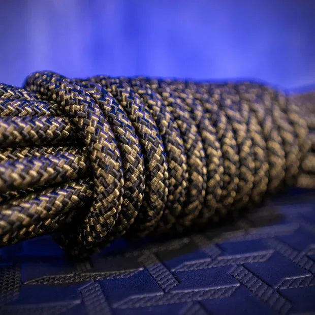 Macro close-up of the olive braided weave on a Grunt Rope bondage rope hank, Fort Troff gay gear at Boyzshop