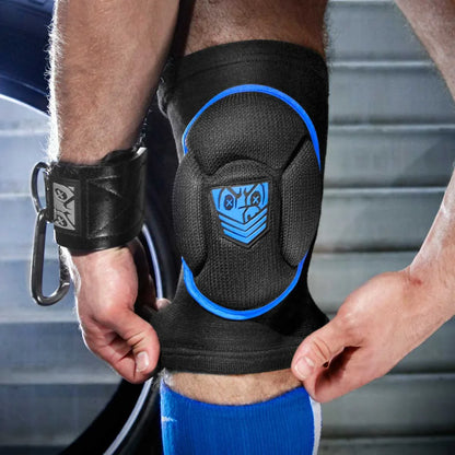 Hands pulling a blue trim Skullfuck knee pad up over the knee, cuffed wrist in frame, Fort Troff gay gear at Boyzshop