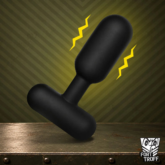 Powershift 300 vibrating prostate massager on a steel ledge, yellow bolts, Fort Troff gay gear at Boyzshop