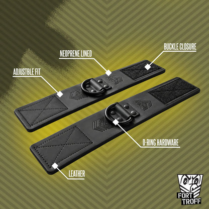 Leather wrist cuffs laid flat with callouts for neoprene lining, adjustable fit plus D-ring, Fort Troff gay gear at Boyzshop
