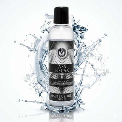Master Series Ass Relax anal desensitizing lubricant bottle surrounded by dramatic water splash on white background