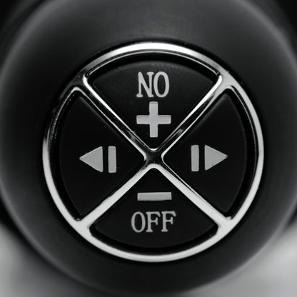 close up of Master Series Violator dildo thruster control buttons showing vibration and mode settings