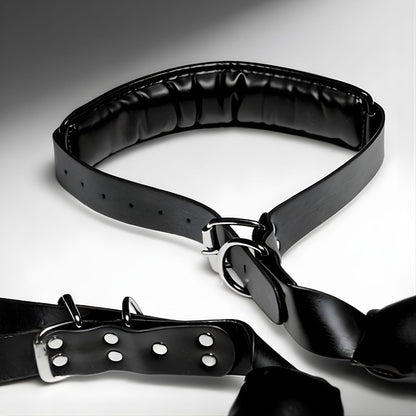 close up of padded black sling cushion with smooth finish and stitched seams