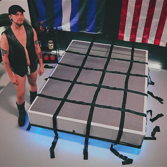 Rock Steady Bed Bondage System video, bed restraints set up on a mattress with the 5th strap, Fort Troff gay gear at Boyzshop