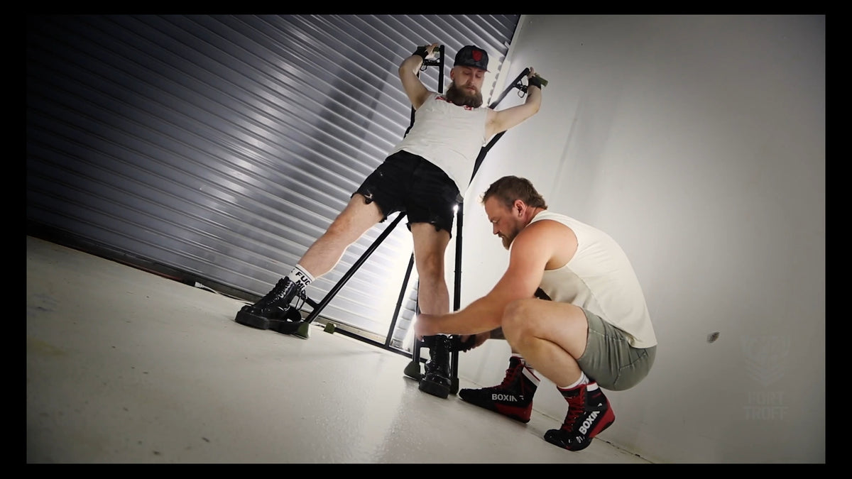 Leather Wrist Cuffs Bondage Restraints video, the cuffs strapping on with Velcro then clipping together, Fort Troff gay gear at Boyzshop