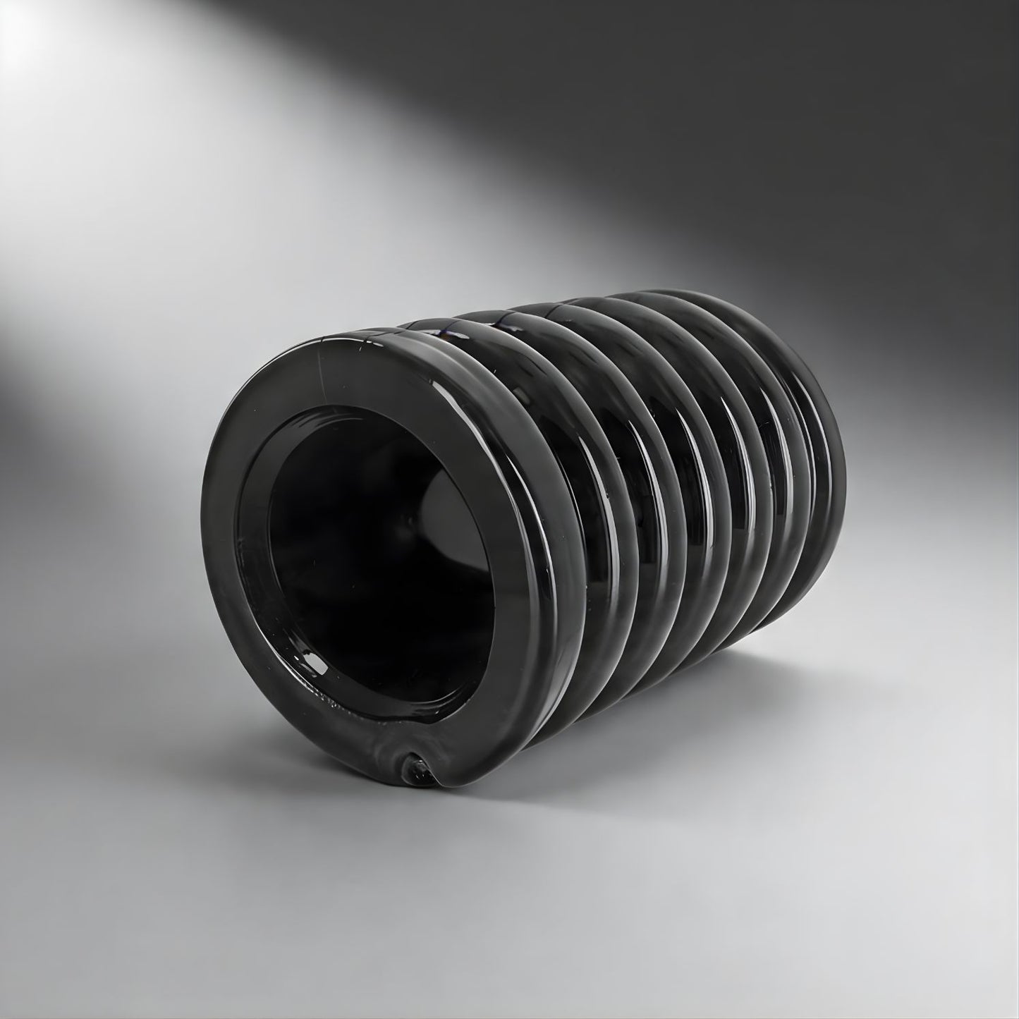 black ribbed ball stretcher sleeve designed for gradual stretch and snug compression fit