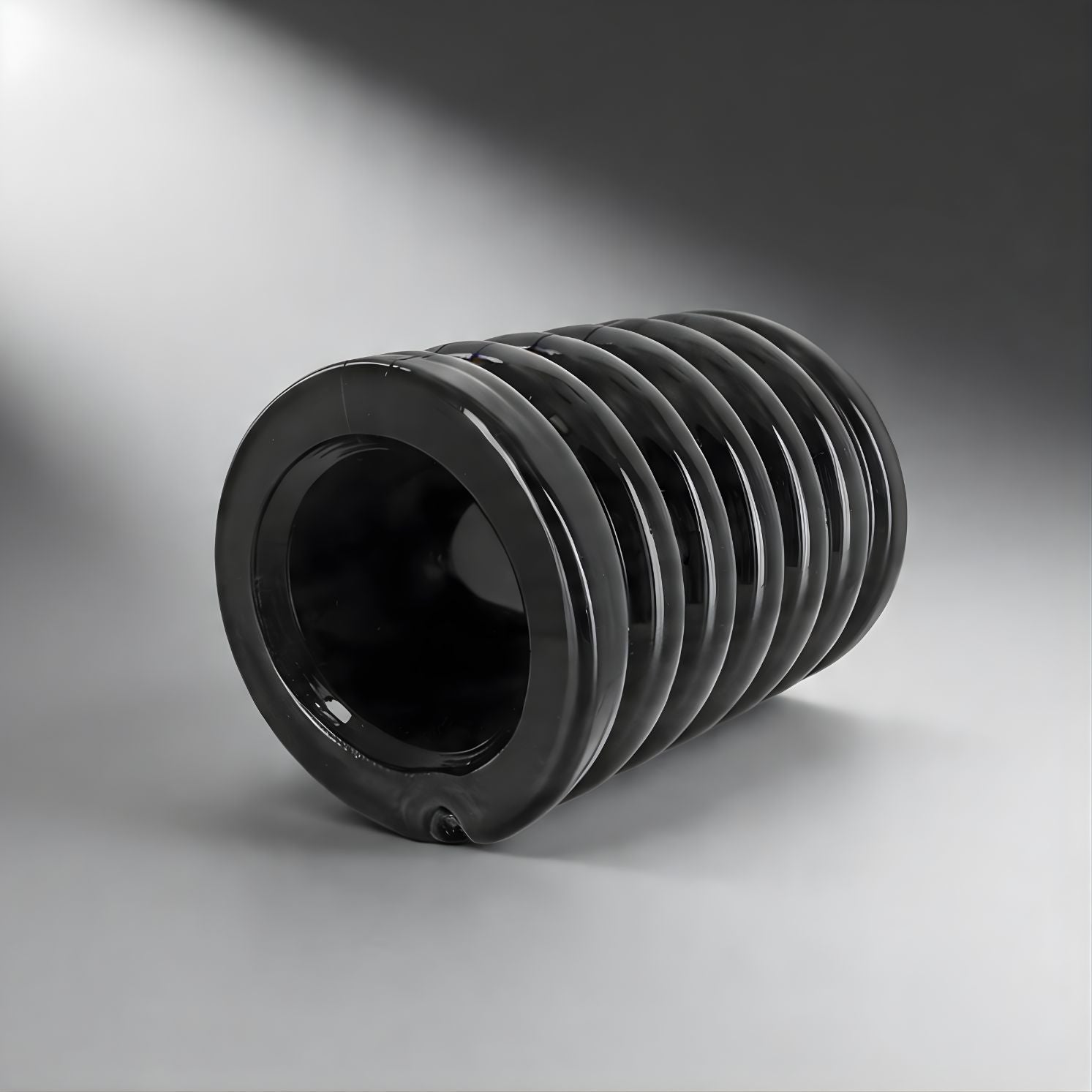 black ribbed ball stretcher sleeve designed for gradual stretch and snug compression fit
