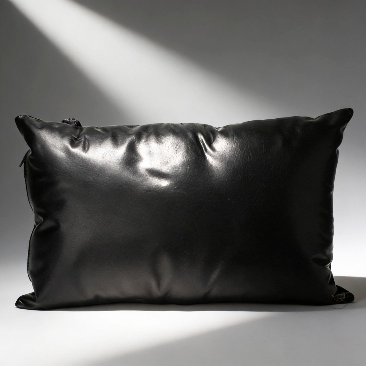 black padded support pillow for leather bondage sling with smooth cushioned surface and zipper closure